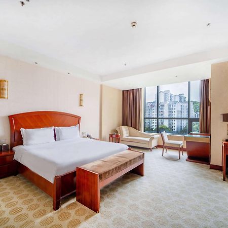 Hotel Ramada Plaza By Wyndham Chongqing West Exterior foto