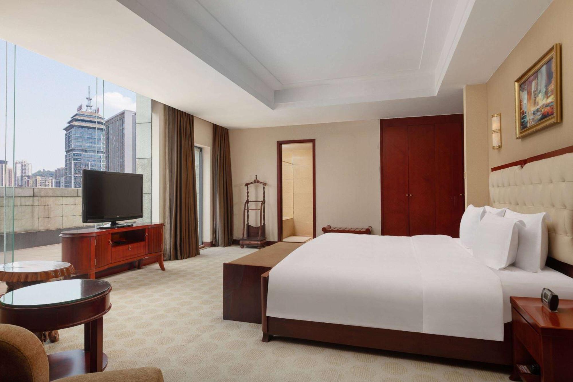 Hotel Ramada Plaza By Wyndham Chongqing West Exterior foto