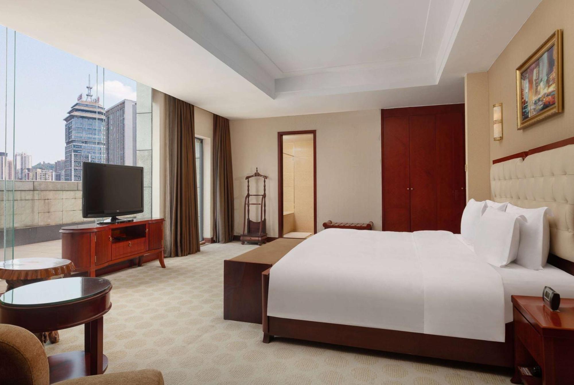 Hotel Ramada Plaza By Wyndham Chongqing West Exterior foto