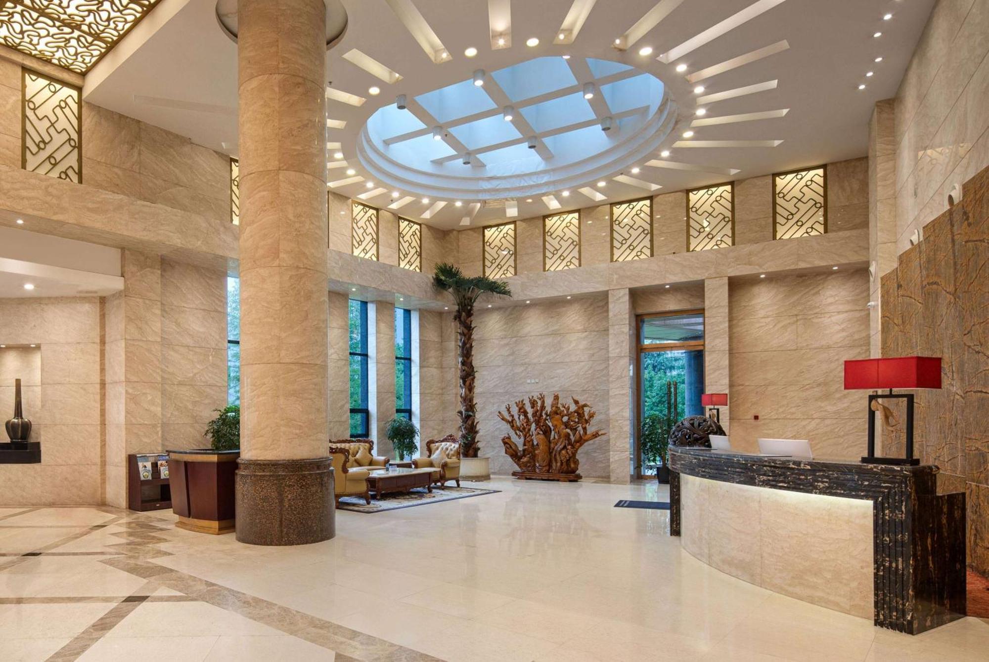 Hotel Ramada Plaza By Wyndham Chongqing West Exterior foto